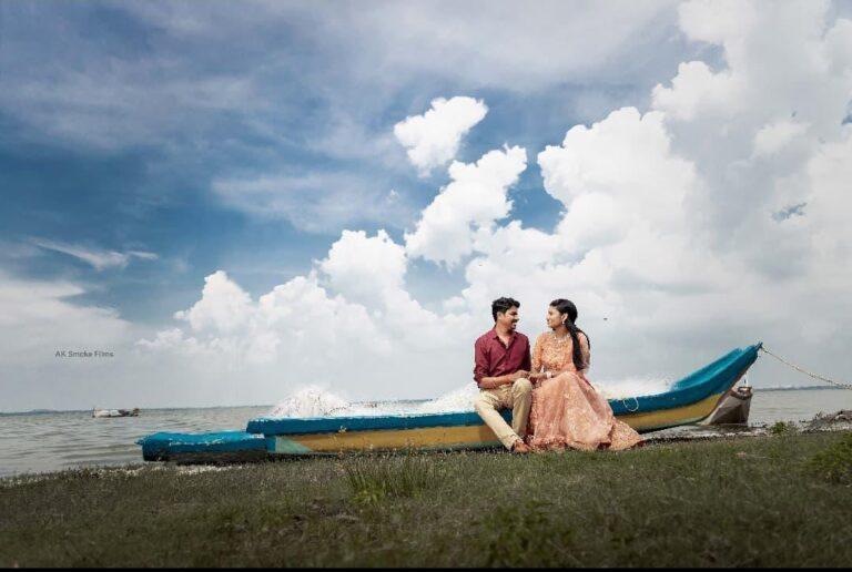 In a backwater background, couple sitting on a boat facing eachother