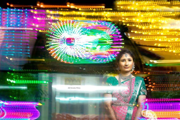 Bride clicked with colorful lights behind with slow shuttered shots